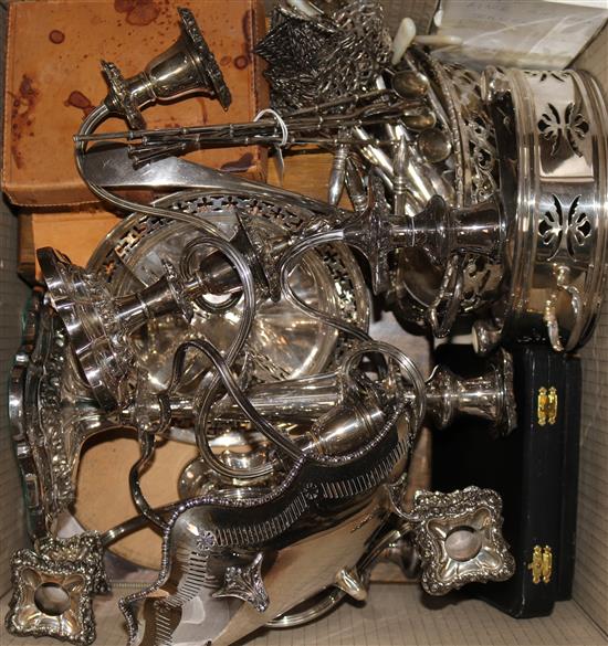 A cased pair of silver clothes brushes, five long cocktail stirring spoons and a quantity of plated items including candelabra, etc.